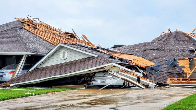Damaged buildings and vehicles in Monroe, La., are seen in the aftermath of a tornado April 12, 2020. The National Weather Service reported April 13 that more than 30 tornadoes ripped across Texas, Louisiana, Mississippi and Georgia. (CNS photo/Peter Tuberville, social media via Reuters)