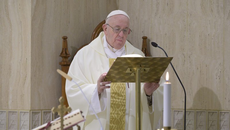 Pope Francis delivers the homily as he celebrates Mass in the chapel of his Vatican residence, the Domus Sanctae Marthae, April 14, 2020. The pope prayed that God would give Christians the grace to remain united and faithful in times of trial. (CNS photo/Vatican Media)