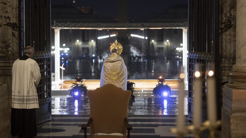 Pope Francis leads Benediction during a prayer service in an empty St. Peter's Square at the Vatican March 27, 2020. Although the pope usually draws large in-person crowds, during the COVID-19 pandemic his assemblies have reached the faithful through television, radio and the internet. (CNS photo/Vatican Media)