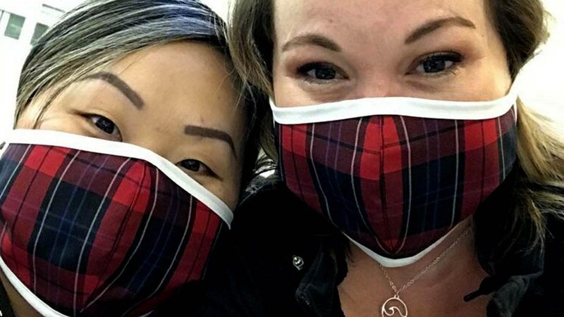 Medical workers from Kaiser Permanente in Oregon wear donated coronavirus masks made by Dennis Uniform. The Portland company makes school uniforms for 2,500 private and Catholic schools throughout the U.S. (CNS photo/courtesy Dennis Uniform)