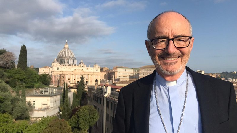 Cardinal Michael Czerny, undersecretary for the Vatican's Migrants and Refugees Section, stands on the terrace of the Jesuit residence in Rome April 22, 2020, where he lives and, during the coronavirus lockdown, works. (CNS photo/courtesy Cardinal Czerny)