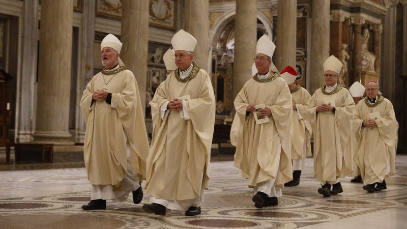 Archbishop Jose H. Gomez of Los Angeles, president of the U.S. Conference of Catholic Bishops, and other bishops from California, Hawaii and Nevada arrive to concelebrate Mass at the Basilica of St. Mary Major while making their "ad limina" visits in Rome Jan. 30, 2020. California bishops are asking Gov. Gavin Newsom to increase aid to immigrants in the country without documents and low-wage workers during the coronavirus pandemic. (CNS photo/Paul Haring)