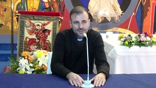 Father Gabriel Benedicto, pastor of the Church of Our Lady of La Paloma in Madrid, speaks via Zoom video chat April 23, 2020. The Spanish priest, along with other priests at the parish, have been serenading their parish neighborhood with a festive repertoire of music since March during a nationwide lockdown because of the COVID-19 pandemic. (CNS photo/YouTube)
