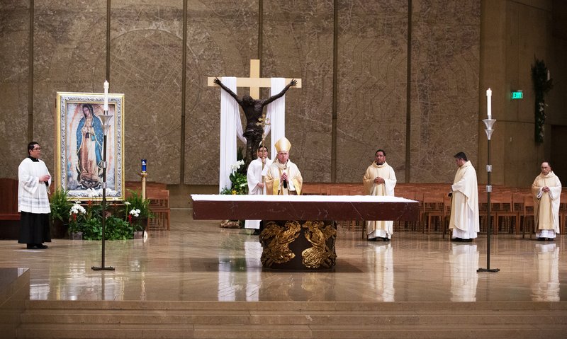 Archbishop Gomez celebrates Easter Vigil Mass April 11. (Victor Alemán)