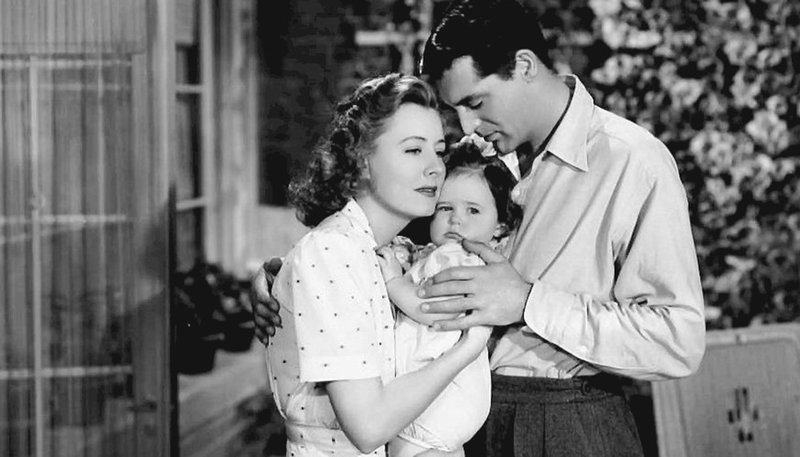 Irene Dunne, Cary Grant, and Jane Biffle in "Penny Serenade." (IMDB)