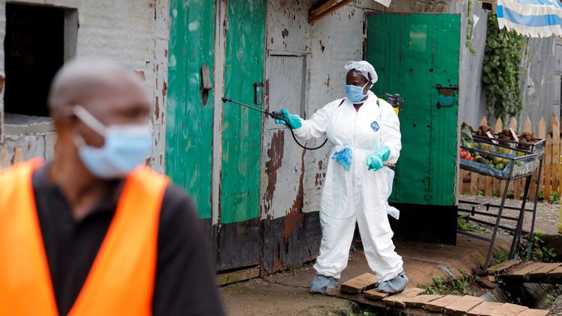A worker sprays disinfectant in an effort to help fight the spread of COVID-19 in Nairobi, Kenya, May 2, 2020. (CNS photo/Baz Ratner, Reuters)
