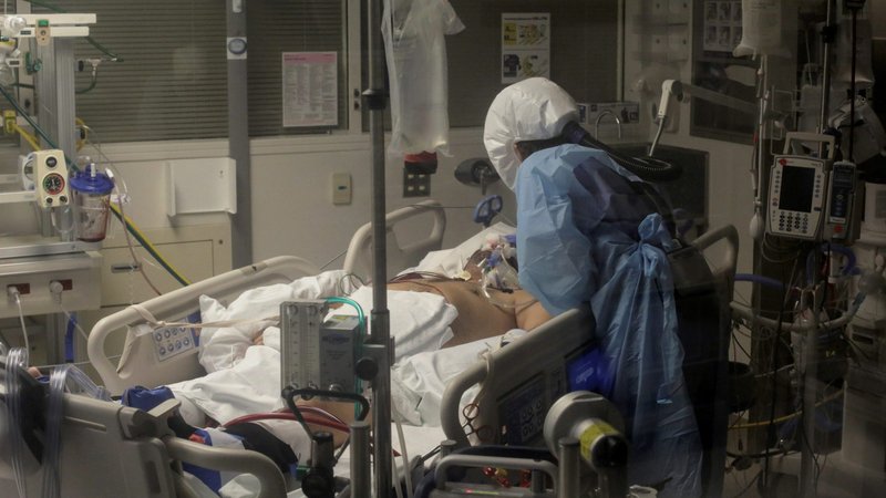 Nurse Leah Silver cares for a patient sick with the coronavirus in the COVID-19 ICU at the University of Washington Medical Center-Montlake in Seattle April 24, 2020. (CNS photo/David Ryder, Reuters)