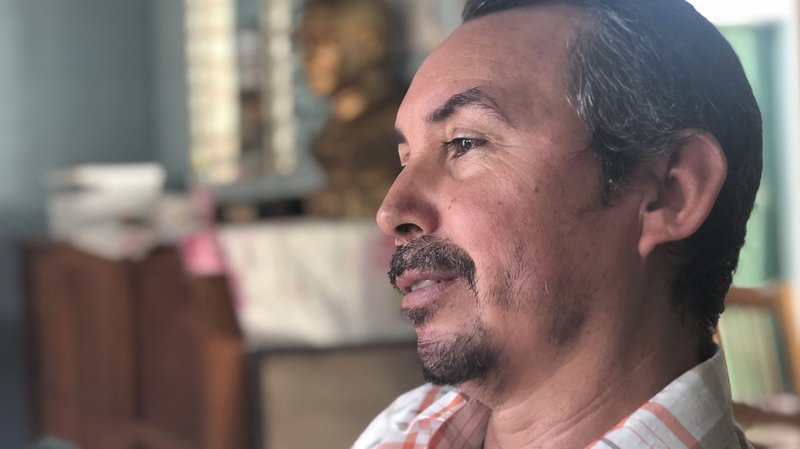 Julio Rivera, 48, speaks in San Jose Las Flores, El Salvador, Jan. 10, 2020, with other survivors of the May 1980 Sumpul River massacre. Rivera, who also survived other mass killings in his home region of Chalatenango, said he sometimes feels demoralized by the lack of justice for the country's war crimes, but El Salvador's Catholic martyrs and support by the church have taught him to seek God's help. (CNS photo/ Rhina Guidos)