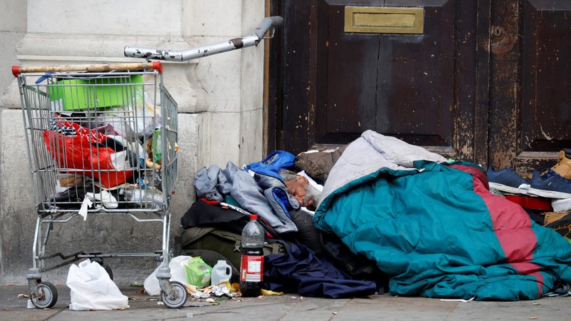 A homeless man sleeps in a doorway in Manchester, England, in mid-May, during the COVID-19 pandemic. Commemorating the fifth anniversary of his encyclical "Laudato Si'," Pope Francis called on Christians to join in prayer and acts of care for the earth and for the poor. (CNS photo/Phil Noble, Reuters)