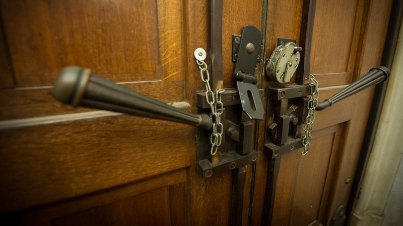 The doors of a London church are seen locked in late March during the COVID-19 pandemic. During a recent online meeting, Msgr. Janusz Urbanczyk, the Holy See's representative to the Organization for Security and Cooperation in Europe, said anti-religious bias was evident during the lockdown. (CNS photo/Latin America News Agency via Reuters)