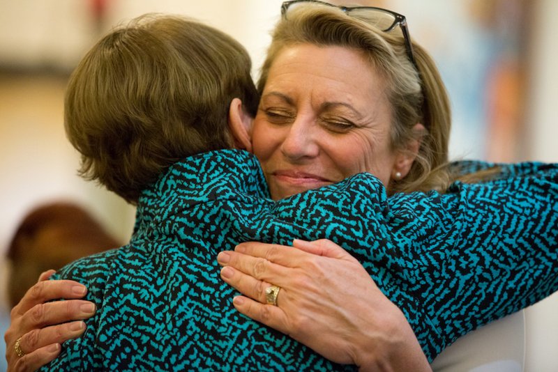 Dr. Heather Banis hugs an attendee of a Mass of Reparation and Healing at St. Euphrasia Church in Granada Hills in 2018. (ADLA file photo)