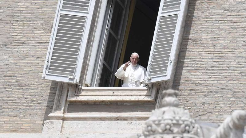 Pope Francis waves from a window of the apostolic palace May 10, 2020. (Vatican Media via CNA)