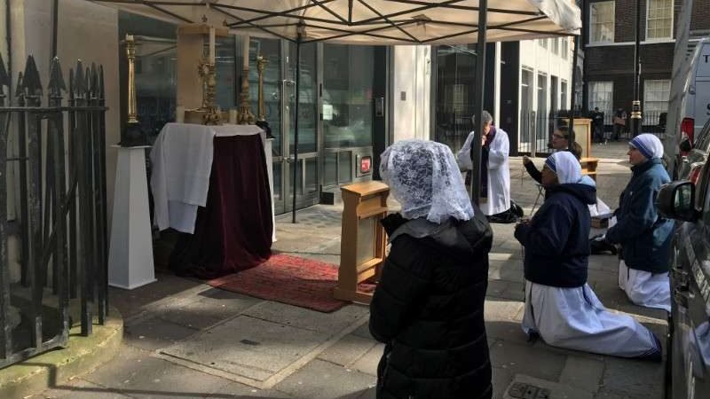Adoration takes place outside St. Patrick’s, Soho, in London’s West End. (Courtesy St. Patrick’s, Soho via CNA)
