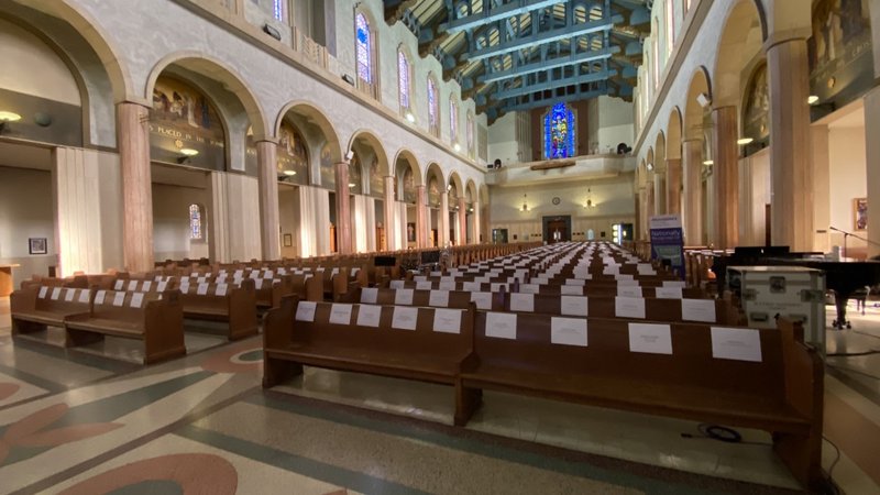 The names of first responders and essential workers are displayed on empty pews at Blessed Sacrament Church May 17. (Courtesy Blessed Sacrament Church)