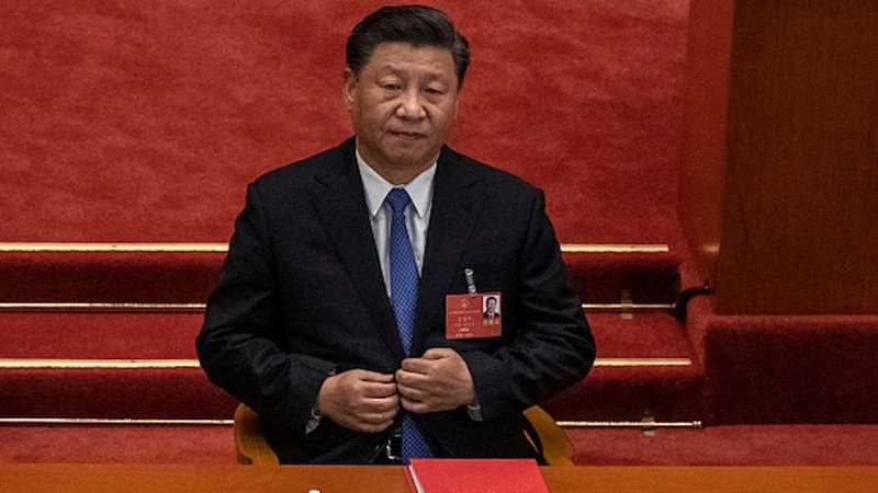 Chinese president Xi Jinping listens during a May 28 session of the National People's Congress, which included a vote on a new draft security bill for Hong Kong. (Kevin Frayer/Getty Images via CNA)