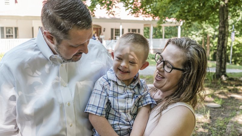 Daniel and Michelle Schachle hold their son Mikey, 5, near their home in in Dickson, Tenn., June 2, 2020. Five years ago, Dan and Michelle prayed to Father Michael McGivney, founder of the Knights of Columbus, to intercede with God to save their son, still in his mother's womb, who was given no hope of surviving a life-threatening case of fetal hydrops. (CNS photo/Rick Musacchio, Tennessee Register)