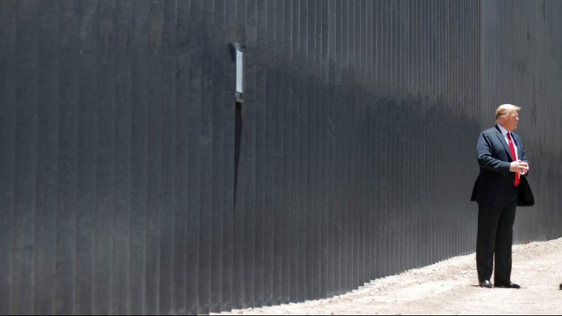 President Donald Trump tours a section of the U.S.-Mexico border wall in San Luis, Ariz., June 23, 2020. The U.S. has suspended some visas and extended immigration restrictions. (CNS photo/Carlos Barria, Reuters)