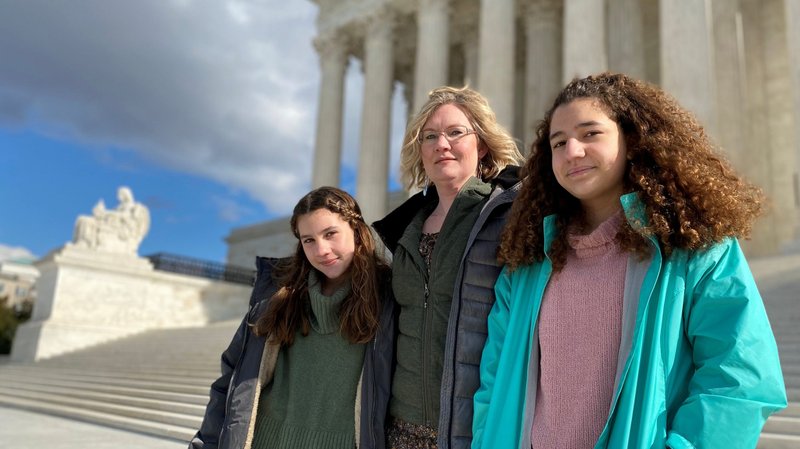 Montana resident Kendra Espinoza, a key plaintiff in a religious rights case involving school choice, poses for a photo in front of the U.S. Supreme Court with her daughters Sarah and Naomi Jan. 19, 2020. The court ruled June 30 that religious schools can not be excluded from Montana's school tax-credit program. (CNS photo/Will Dunham, Reuters)