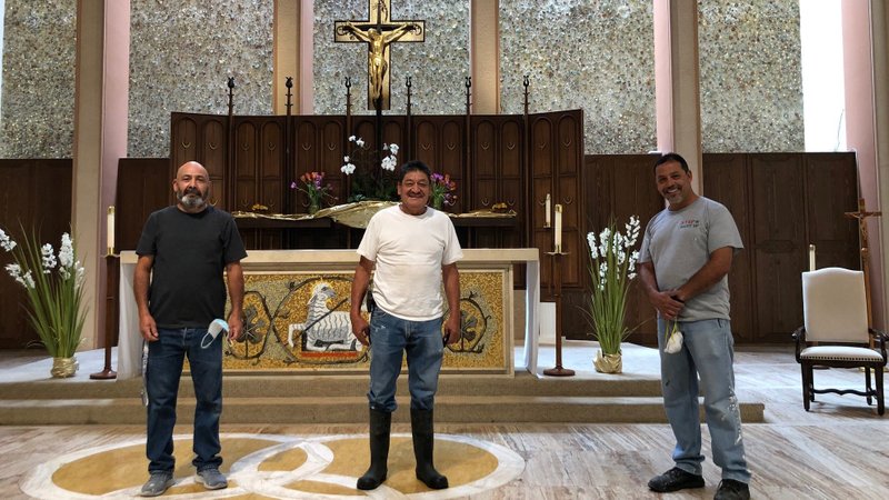 From left: Workers Concepcion Martinez, Pedro Fuentes, and maintenance foreman Manuel Pacheco inside St. Paul the Apostle Church during repairs.(Vanessa Reyes Smith)