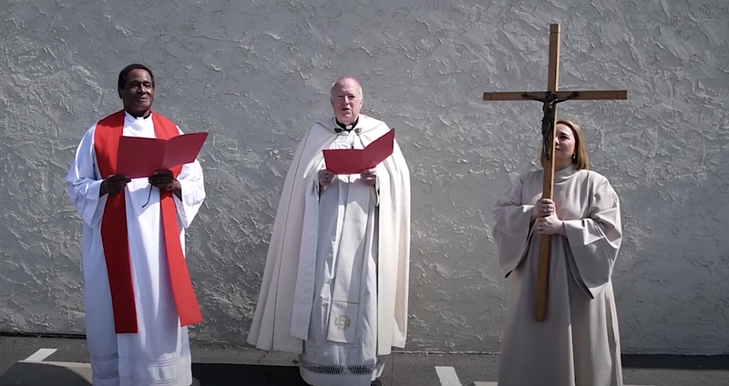 The Diocese of San Diego presented the tenth Station of the Cross in central San Diego where the headquarters of the KKK stood in 1920. (Screenshot via YouTube)