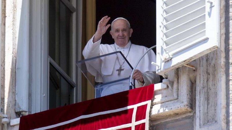 Pope Francis waves from his window overlooking St. Peter’s Square during an Angelus address. (Vatican Media via CNA)