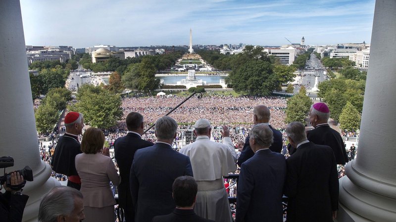 Pope Francis is welcomed to the Speakers Balcony at the U.S. Capitol by members of Congress Sept. 24. (CNS photo/Doug Mills, pool)