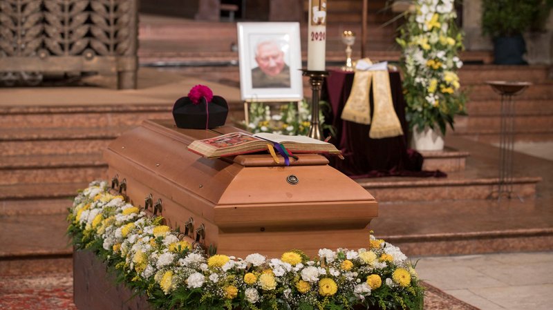 A photo is seen near the casket of Msgr. Georg Ratzinger, brother of retired Pope Benedict XVI, during his funeral Mass at the cathedral in Regensburg , Germany, July 8, 2020. (CNS photo/Uwe Moosburger, Bistum Regensburg via Reuters)