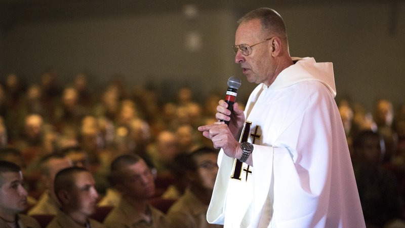In this 2016 file photo, Father Michael A. Mikstay, a Navy chaplain at Marine Corps Recruit Depot San Diego, speaks to new Marines during a Mass about how the Catholic Church can impact their faith, family life and careers. (CNS photo/Chaz Muth)