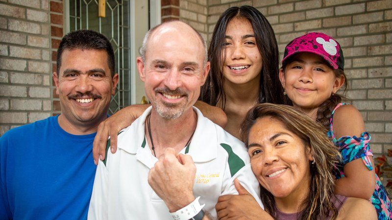 Father Christopher Wadelton of Indianapolis poses for a photo with Rebeca Barcenas, right, and her family in this undated photo. Father Wadelton donated his kidney to Rebeca May 14, 2020. Also pictured are Rebeca's husband, Rafael Ventura and the couple's two daughters, Jennifer and Carmen. (CNS photo/D. Todd Moore, courtesy The Criterion)