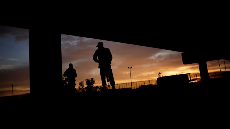 Members of the Mexican National Guard in Ciudad Juarez stand near the U.S. border July 6, 2019. (CNS photo/Jose Luis Gonzalez, Reuters)