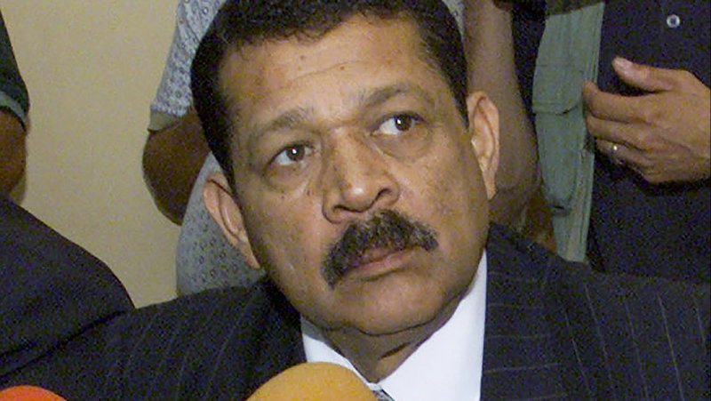Salvadoran Col. Inocente Orlando Montano is pictured during a 2000 news conference denying involvement in the 1989 deaths of six Jesuit priests, their housekeeper and her daughter. (CNS photo/Reuters)