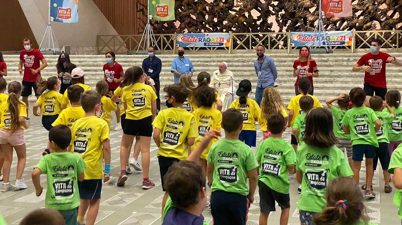 Children perform for Pope Francis, who made a surprise visit to their summer program in the Vatican's Paul VI audience hall July 20, 2020. About 100 children of Vatican employees are attending the program for the month of July. (CNS photo/courtesy Play It)