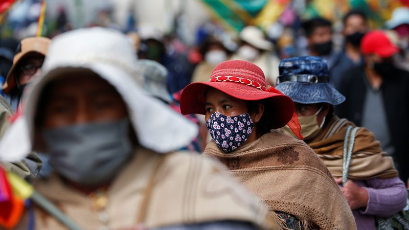 People take part in a July 14, 2020, demonstration in La Paz, Bolivia, called by Bolivian workers unions demanding the economic reactivation of their sectors during the coronavirus pandemic. Church leaders sent a strong message of support to an unprecedented virtual assembly of more than 3,000 indigenous leaders, small farmers, environmental campaigners and women in the Amazon region affected by the COVID-19 pandemic. (CNS photo/David Mercado, Reuters)