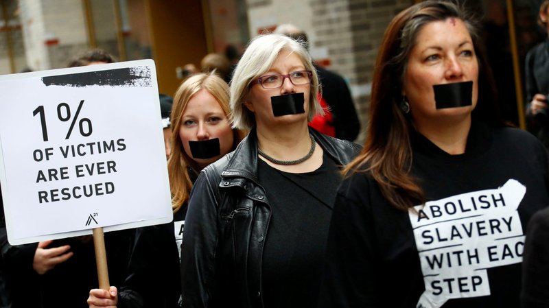 Activists take part in a "Walk for Freedom" in 2018 to protest human trafficking in Berlin. A Vatican representative said the protection of rights and human dignity is not exclusive to the wealthy but also to the most vulnerable, especially victims of human trafficking. (CNS photo/Fabrizio Bensch, Reuters)