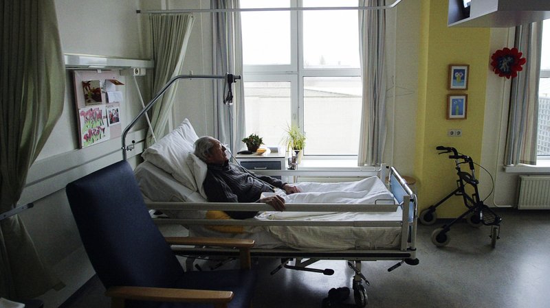 An unidentified man suffering from Alzheimer's disease and who refused to eat sleeps peacefully the day before passing away in a nursing home in Utrecht, Netherlands. On July 27, 2020, a court in Italy acquitted two "right-to-die" activists who aided in the suicide of a person suffering from multiple sclerosis, which may force the Italian government to legalize assisted suicide in the country. (CNS photo/Michael Kooren, Reuters)