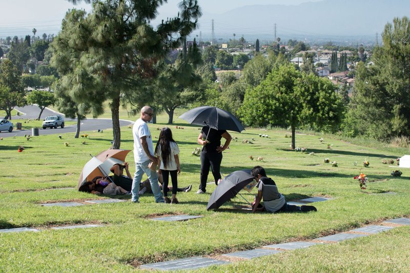 Visitors at Resurrection Cemetery in Rosemead May 27, 2020. (John Michael Filippone)