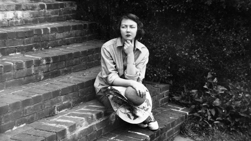 Catholic writer Flannery O'Connor in a Sept. 22, 1959, photo, sitting on the steps of her home in Milledgeville, Ga. (CNS photo/Floyd Jillson/Atlanta Journal-Constition, via AP, courtesy "Flannery")