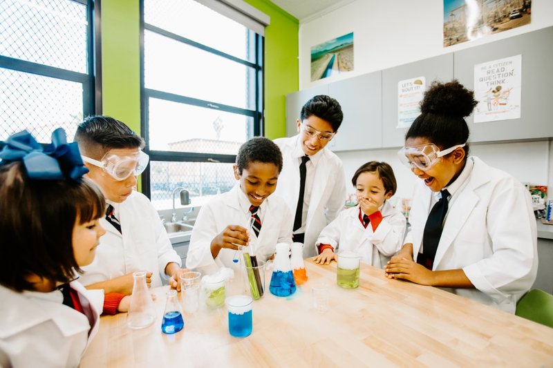 Students at Holy Spirit STEM Academy in Mid-City participate in a science experiment. (Cynthia Garcia)