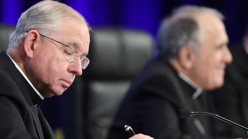 Archbishop Jose H. Gomez of Los Angeles, vice president, of the U.S. Conference of Catholic Bishops and Cardinal Daniel N. DiNardo of Galveston-Houston, president, are seen shortly before Archbishop Gomez was named the new president during the fall general assembly of the USCCB in Baltimore Nov. 12, 2019. (CNS photo/Bob Roller)