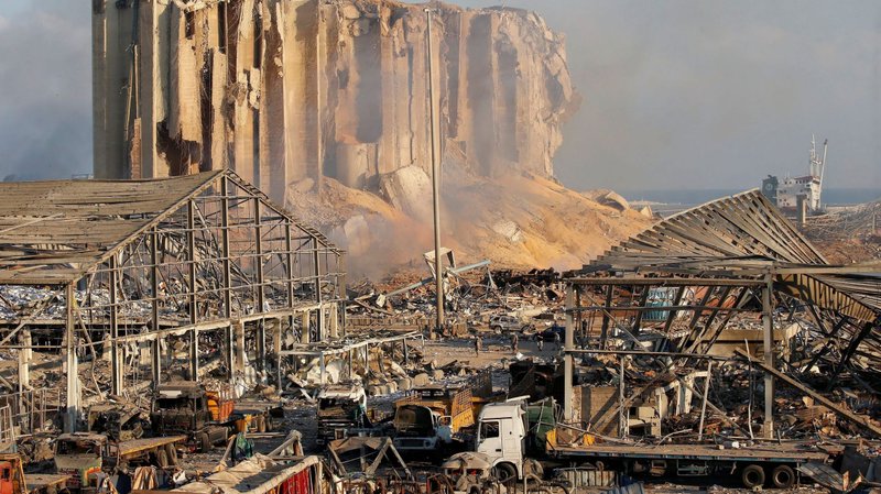 Smoldering debris is seen in Beirut Aug. 5, 2020, following explosions the previous day. Two massive explosions near the port of the Lebanese capital injured dozens of people and shattered windows in buildings blocks away. (CNS photo/Mohamed Azakir, Reuters)