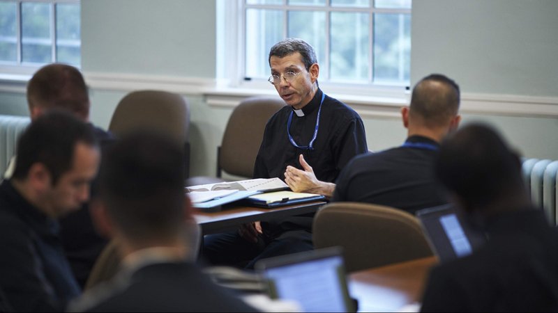 Father John Kartje, rector of Mundelein Seminary at the University of St. Mary of the Lake in Mundelein, Ill., teaches a class examining the Book of Psalms to seminarians Oct. 2, 2019. Father Kartje is hosting an online Bible study during the summer of 2020 called "Living on the Edge of Chaos: Finding Hope in the Face of Fear," which has attracted more than 1,500 participants. (CNS photo/courtesy Mundelein Seminary)