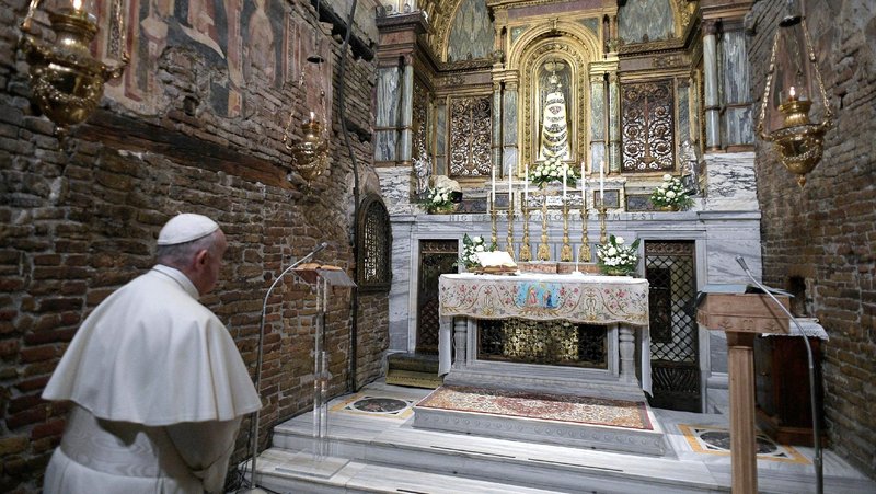 Pope Francis prays before a statue of Our Lady of Loreto at the Sanctuary of the Holy House on the feast of the Annunciation in Loreto, Italy, March 25, 2019. Pope Francis began the Jubilee Year of Our Lady of Loreto Dec. 8, 2019, and has extended the celebration to December 2021. (CNS photo/Vatican Media via Reuters)