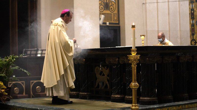 Archbishop Dennis M. Schnurr of Cincinnati celebrates Mass at the Cathedral Basilica of St. Peter in Chains in Cincinnati Aug. 15, 2020. Pope Francis elevated it to a minor basilica that same day, making it the first such church with this designation in the Cincinnati Archdiocese. (CNS photo/courtesy The Catholic Telegraph)