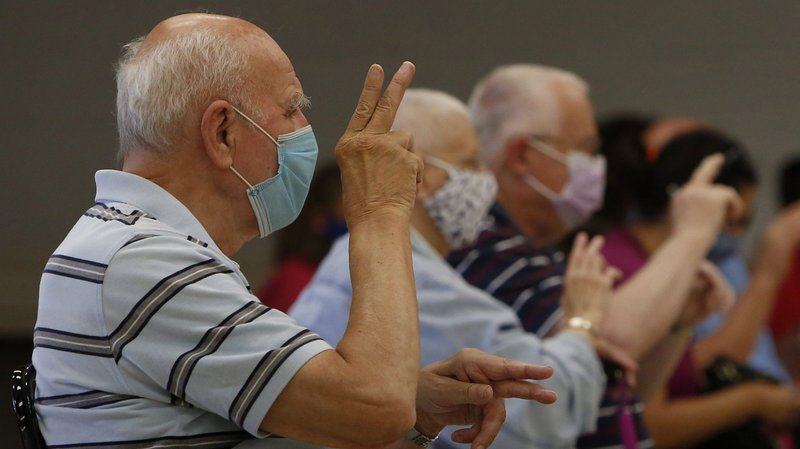 Faithful celebrate Mass in American Sign Language at the St. Francis Borgia Deaf Center Aug. 16, 2020. (CNS photo/Karen Callaway, Chicago Catholic)