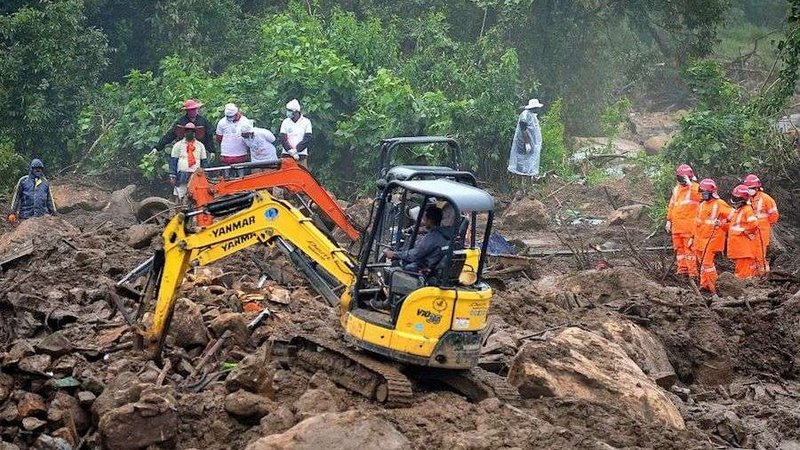 Rescue workers search for missing people at a landslide site in Kerala state Aug. 10, 2020. (STR/AFP/Getty Images via CNA)