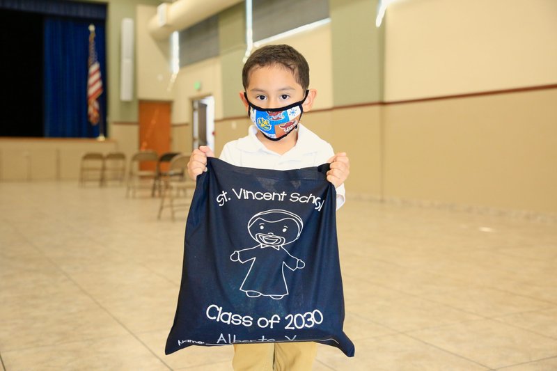 A St. Vincent School kindergartener at a back-to-school “Drive-Thru Meet and Greet” event Aug. 13. DAVID AMADOR RIVERA