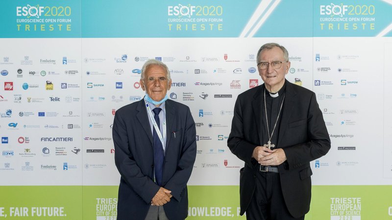 Stefano Fantoni, a well known physicist and nuclear astrophysicist, poses with Cardinal Pietro Parolin, Vatican secretary of state, Sept. 2, 2020, at the EuroScience Open Forum in Trieste, Italy. (CNS photo courtesy ESOF 2020)