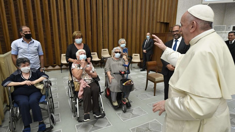 Pope Francis greets people in the Paul VI audience hall at the Vatican Sept. 11, 2020. The pope met with members of the International Gynecologic Cancer Society, an organization that promotes research and education "to enhance the care of women with gynecologic cancer worldwide." (CNS photo/Vatican Media)