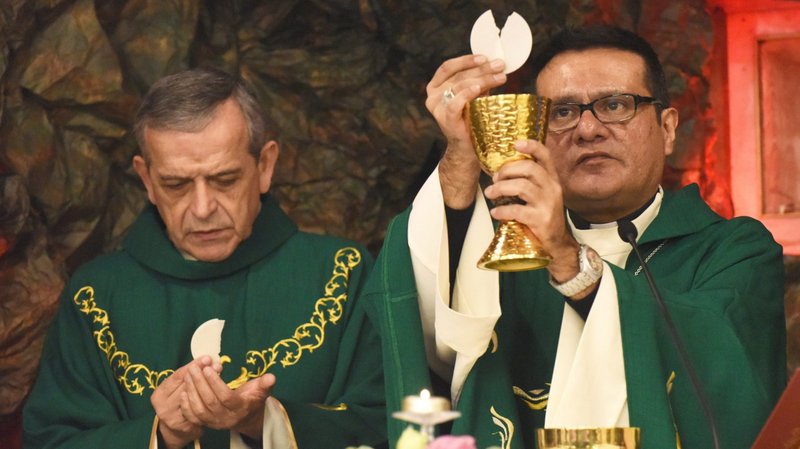 Seattle Auxiliary Bishop Eusebio L. Elizondo and Detroit Auxiliary Bishop Arturo Cepeda concelebrate Mass Jan. 21, 2018, at St. Joseph Church in Jifna, West Bank. In a Sept. 15, 2020, statement marking the beginning of Hispanic Heritage Month in the U.S., Bishop Cepeda, chairman of the U.S. Conference of Catholic Bishops' Subcommittee on Hispanic Affairs, said the Catholic Church and U.S. society must acknowledge the historic and current contributions of Hispanic and Latino leadership in all spheres of church and society. (CNS photo/Debbie Hill)