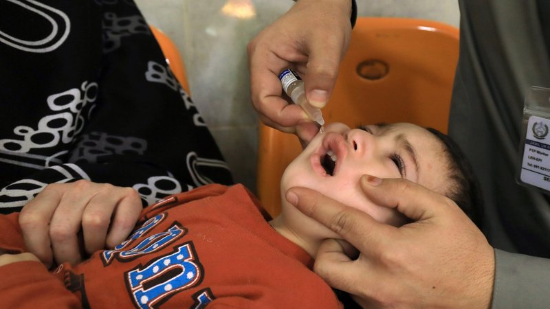 A boy in Peshawar, Pakistan, receives polio vaccine drops outside a hospital April 30, 2019. Sanofi Pasteur, the largest biotech company in the world devoted entirely to vaccines, recently sought and received approval from the U.S. Federal Drug Administration of its decision to ends use of aborted fetal cell lines for vaccines. (CNS photo/Fayaz Aziz, Reuters)